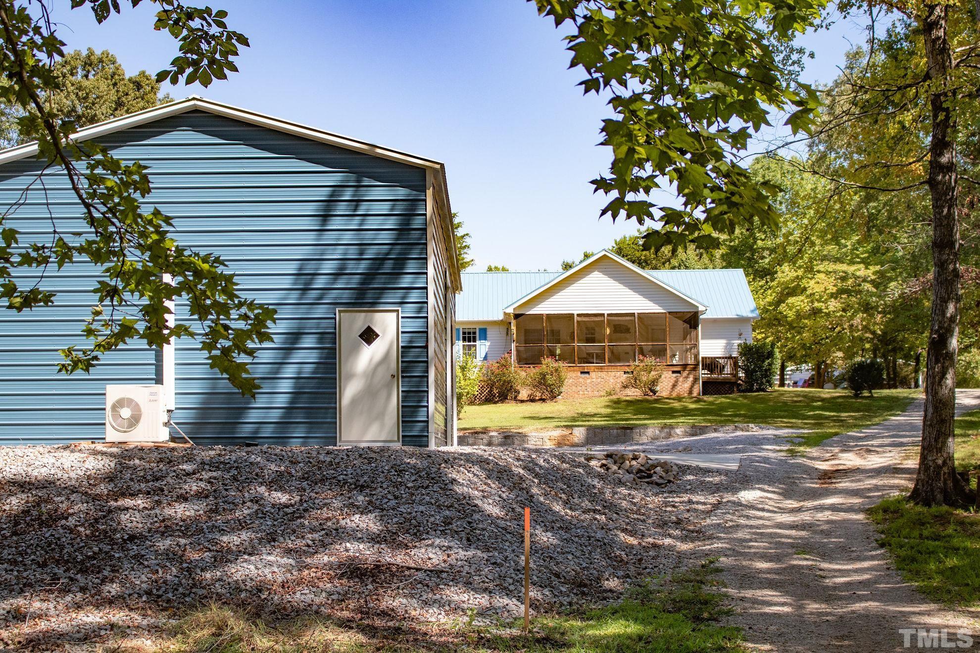 260 Waters Edge Loop Henderson, NC 27537 - Photo 29 of 38 a view of a house with a yard