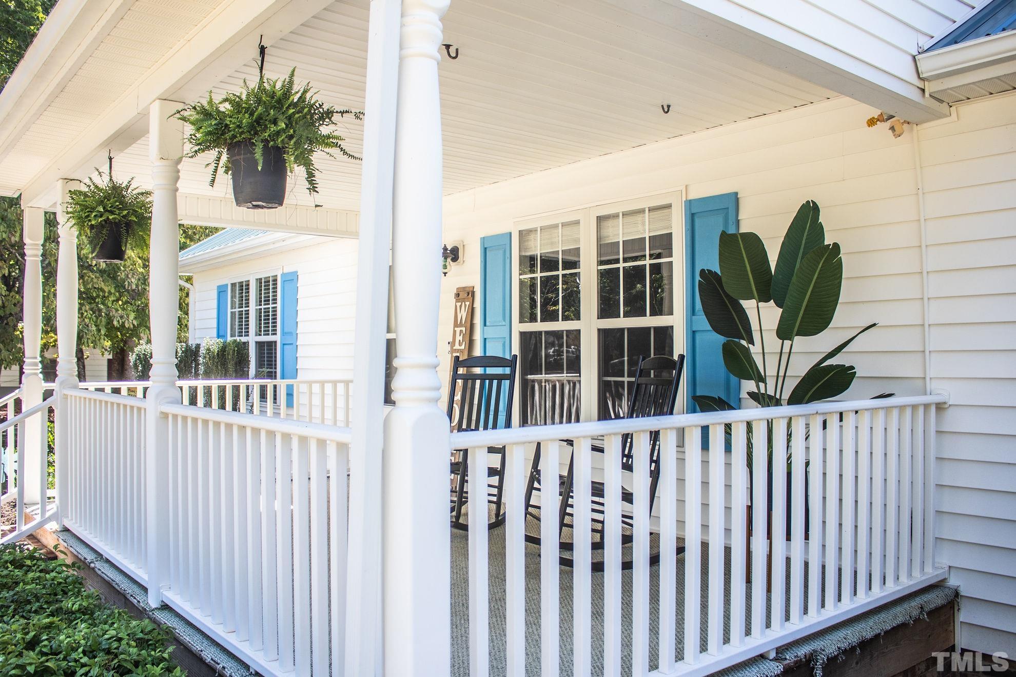260 Waters Edge Loop Henderson, NC 27537 - Photo 6 of 38 a view of a house with a wooden fence