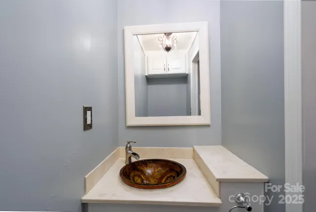 a utility room with closet dryer and washer