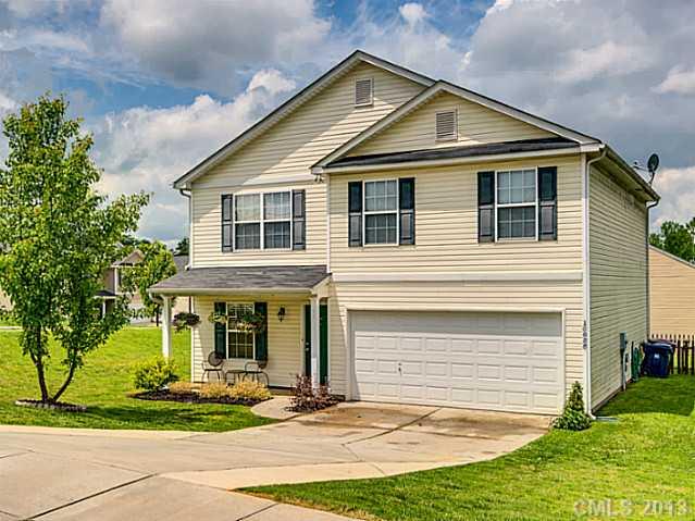10628 Pointer Ridge Drive Charlotte, NC 28214 - Photo 1 of 16 a front view of a house with a yard