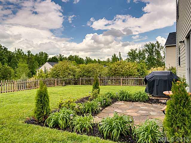 10628 Pointer Ridge Drive Charlotte, NC 28214 - Photo 16 of 16 a view of a backyard with garden