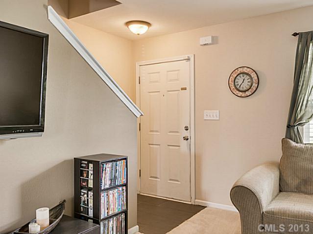 10628 Pointer Ridge Drive Charlotte, NC 28214 - Photo 3 of 16 a view of livingroom with furniture and wooden floor