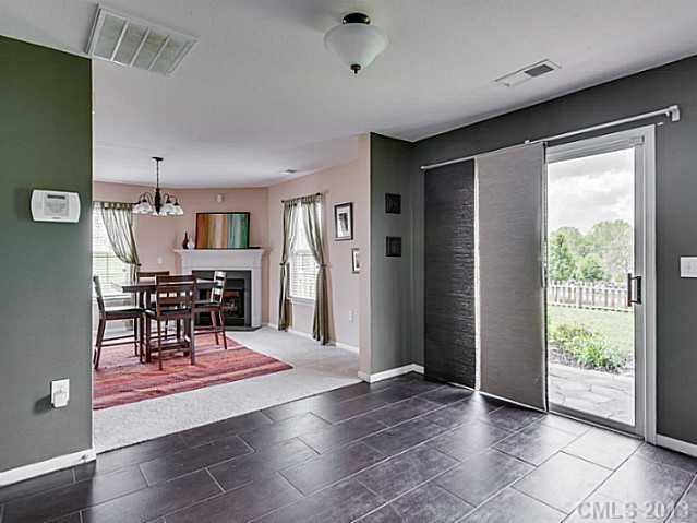 10628 Pointer Ridge Drive Charlotte, NC 28214 - Photo 6 of 16 a view of a livingroom with furniture and an empty room