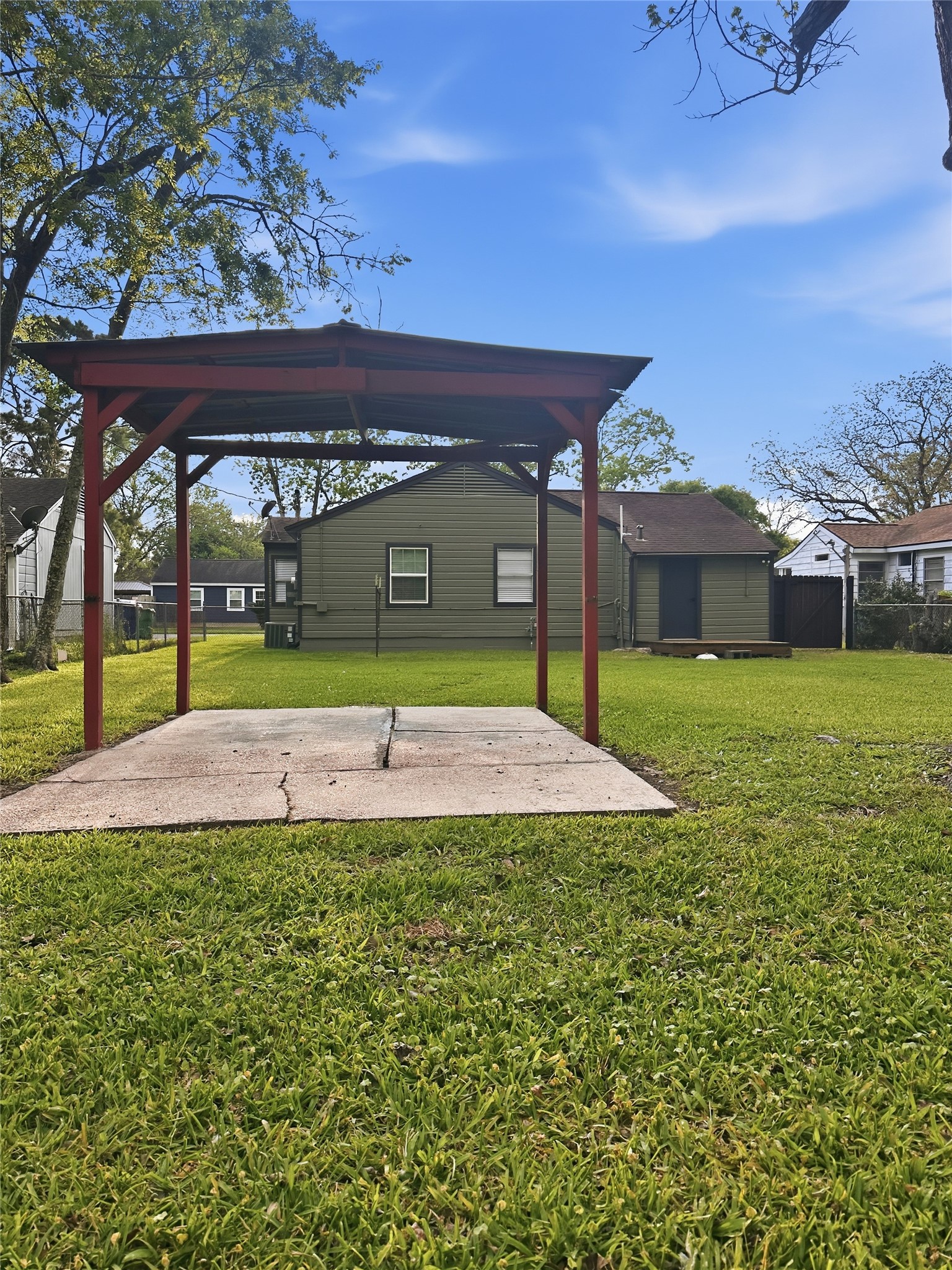1308 North Rockisland Street Angleton, TX 77515 - Photo 13 of 13 a view of a swimming pool with a yard