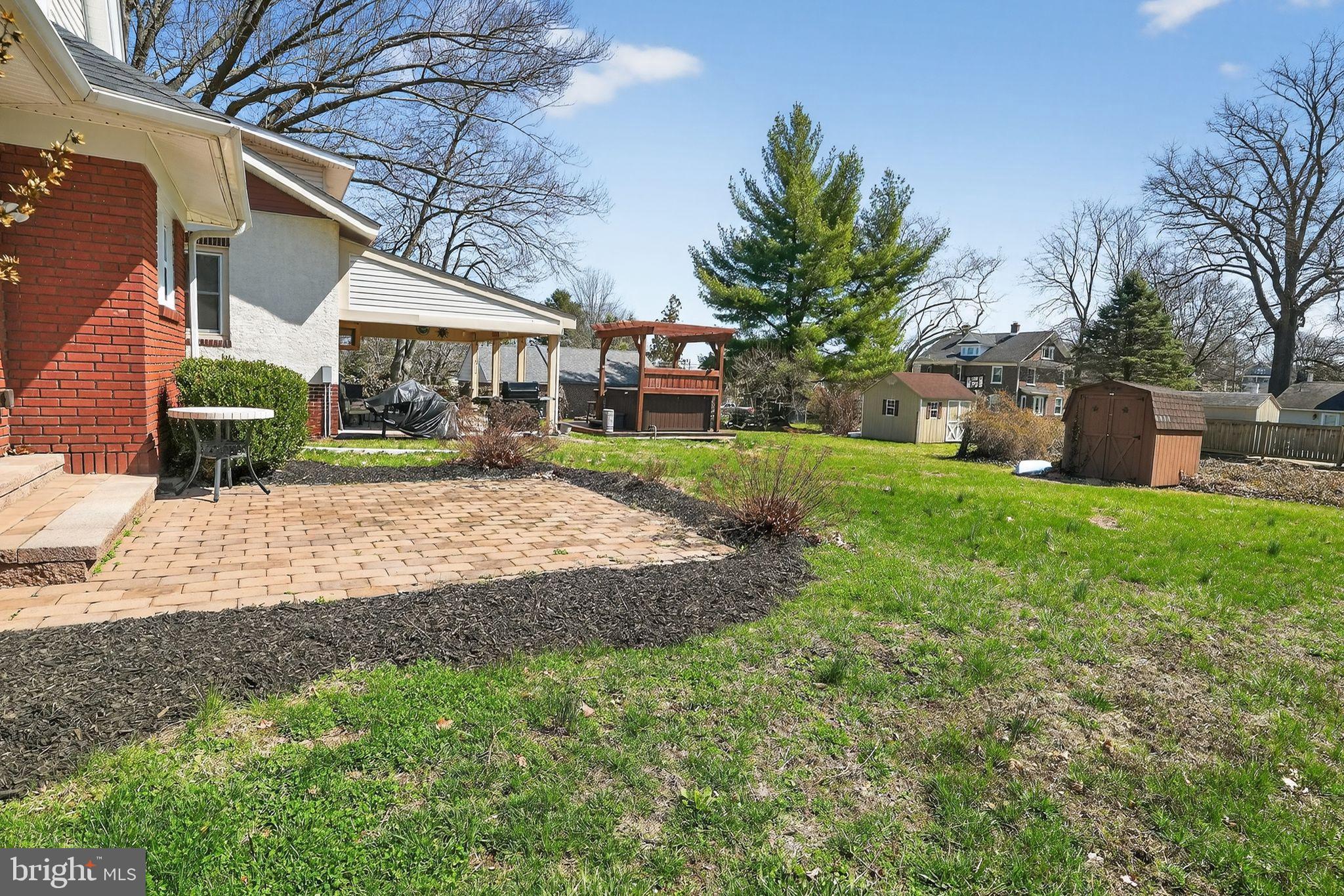 424 Arch Street Spring City, PA 19475 - Photo 6 of 32 a view of a house with a yard and tree s