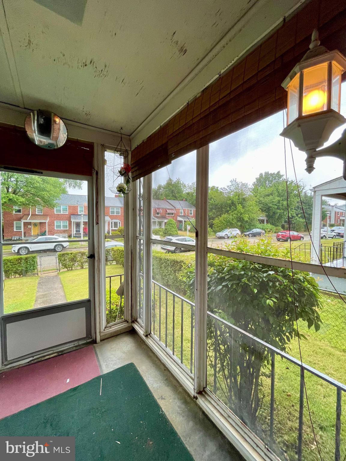 1042 Reverdy Road Baltimore, MD 21212 - Photo 21 of 25 Screened Front Porch