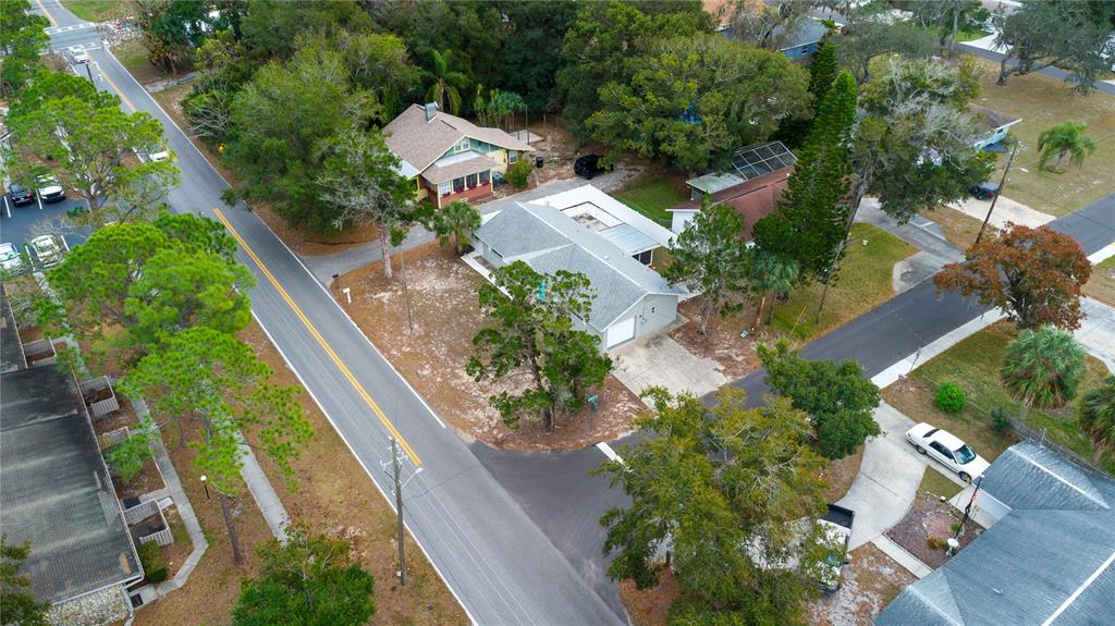 6414 Indiana Avenue New Port Richey, FL 34653 - Photo 26 of 31 an aerial view of house with yard