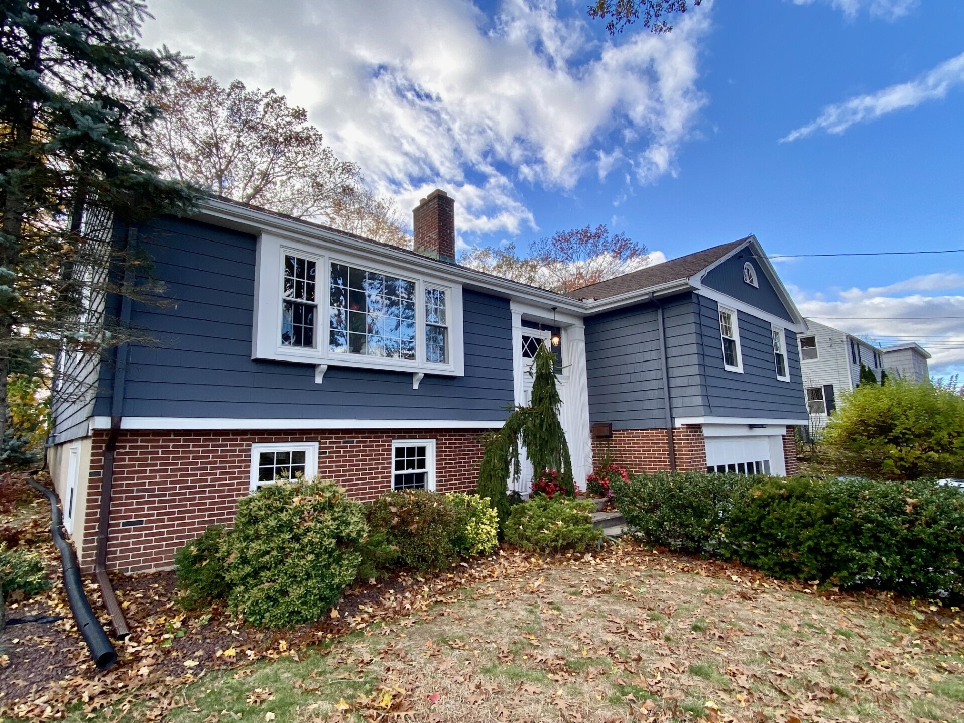 841 Ridge Road Wethersfield, CT 06109 - Photo 1 of 1 a front view of a house with garden