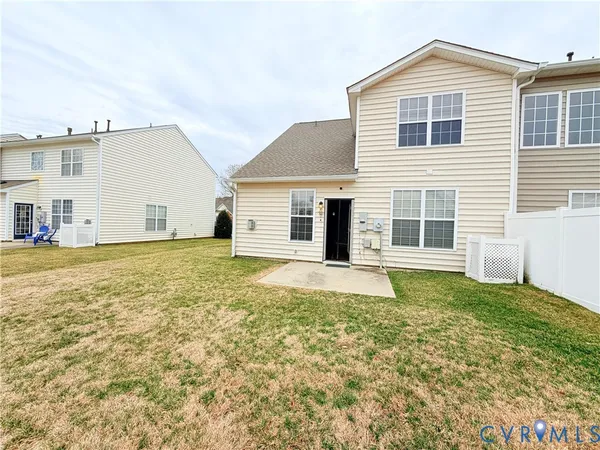 a house that has a big yard in front of it