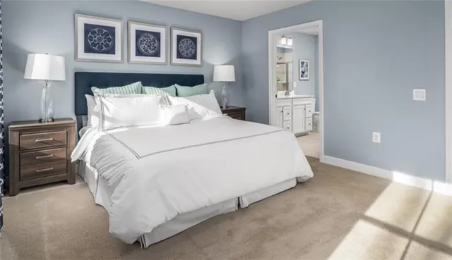 a bathroom with a toilet sink and shower