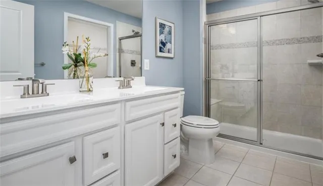 a bedroom with bed and a window