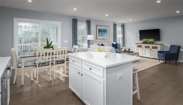a view of living room with furniture and flat screen tv