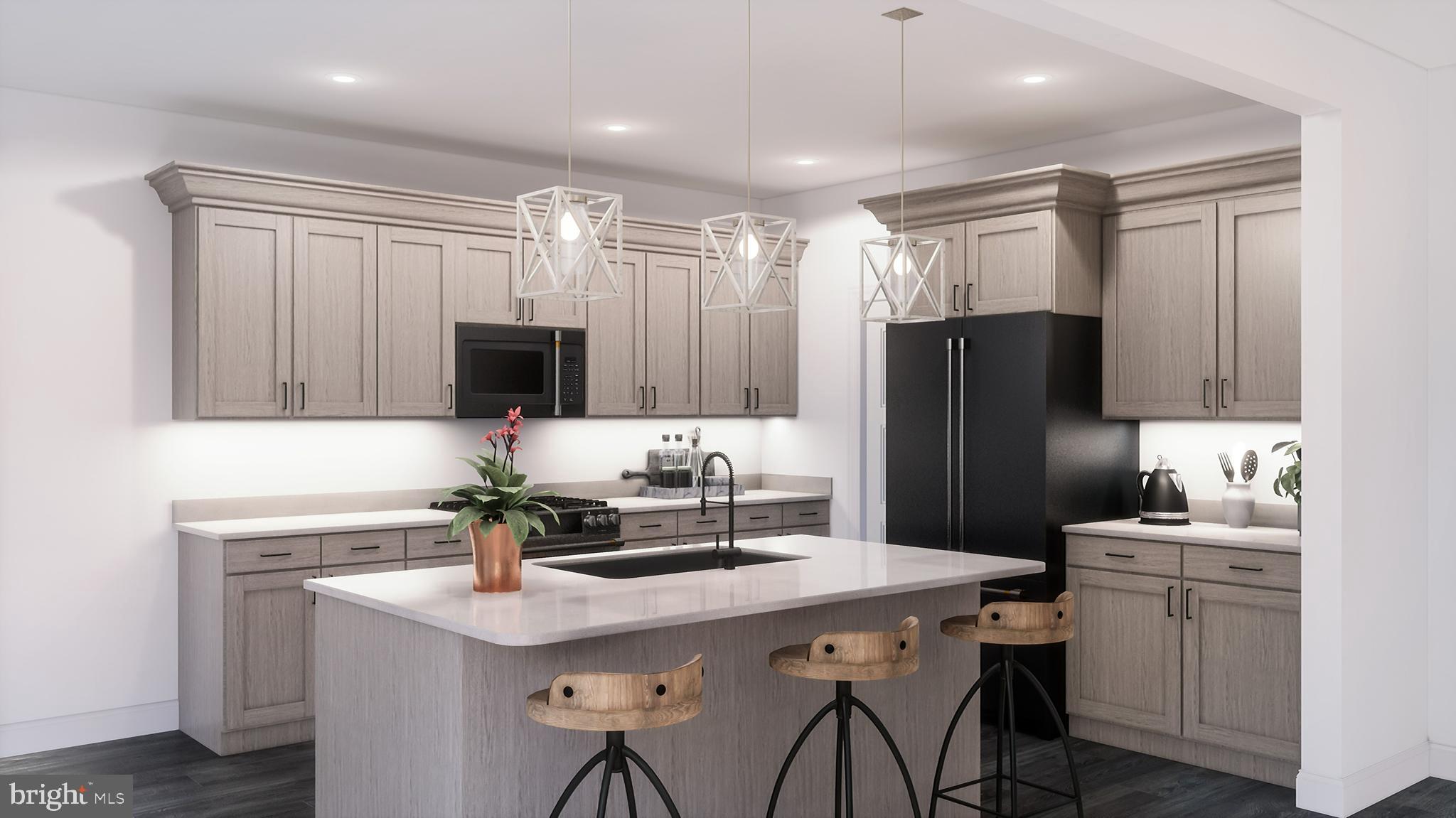 31772 Stevensons Road Dagsboro, DE 19939 - Photo 4 of 28 a kitchen with a sink refrigerator and microwave
