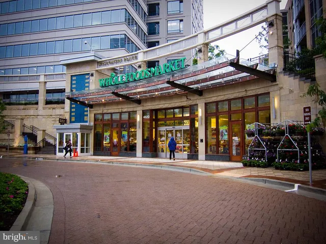 a view of a building with sitting area