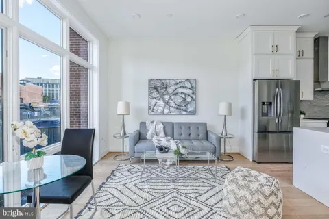 a bedroom with a bed furniture and a window