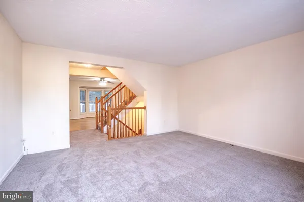 a view of livingroom with stairs