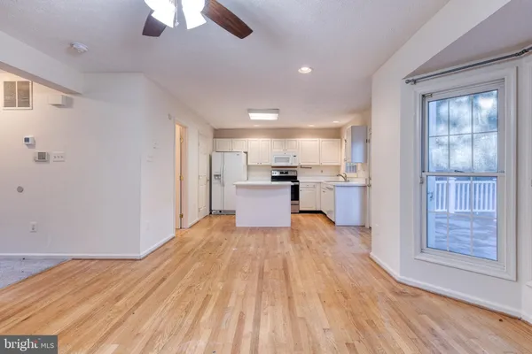 a view of kitchen with wooden floor