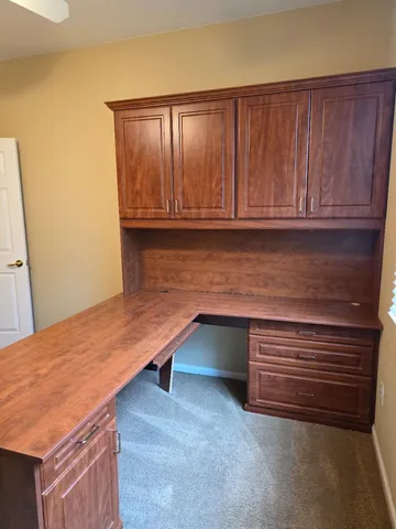 a view of storage and utility room with washer and dryer