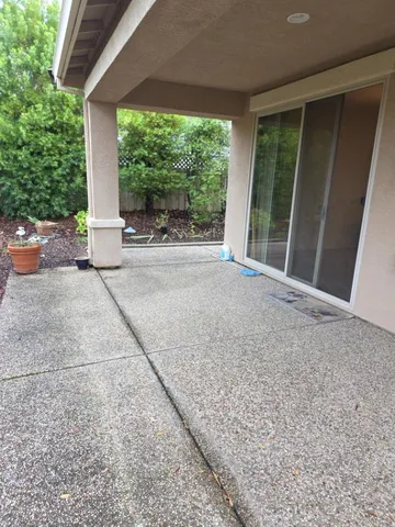 a living room with furniture dining table and a large window