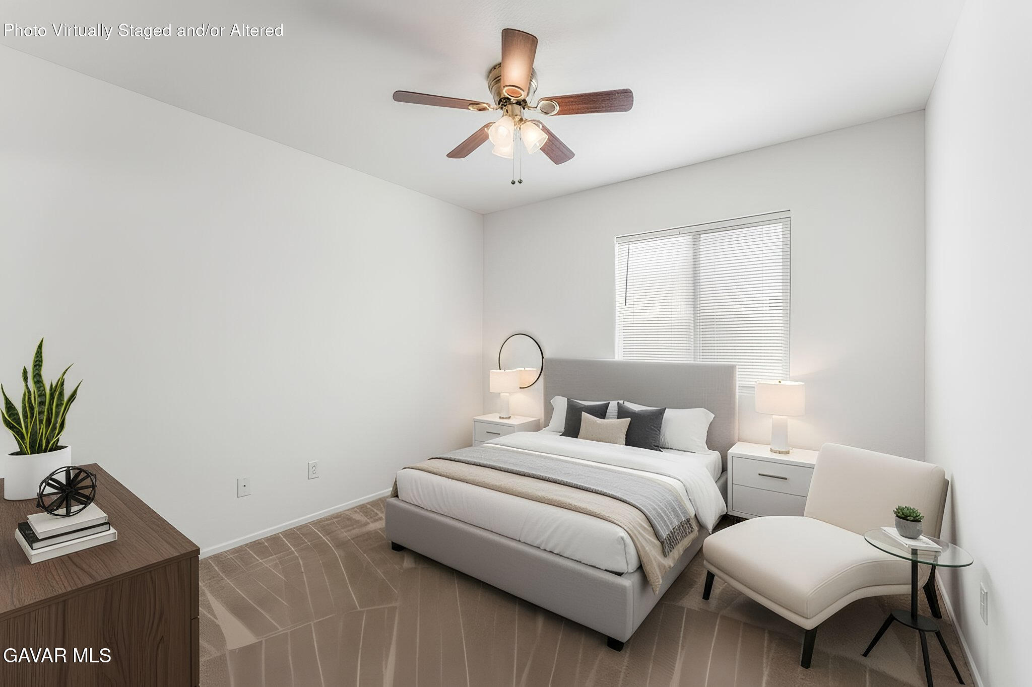 45334 Stadium Lane Lancaster, CA 93535 - Photo 17 of 36 a bedroom with a bed and a couch