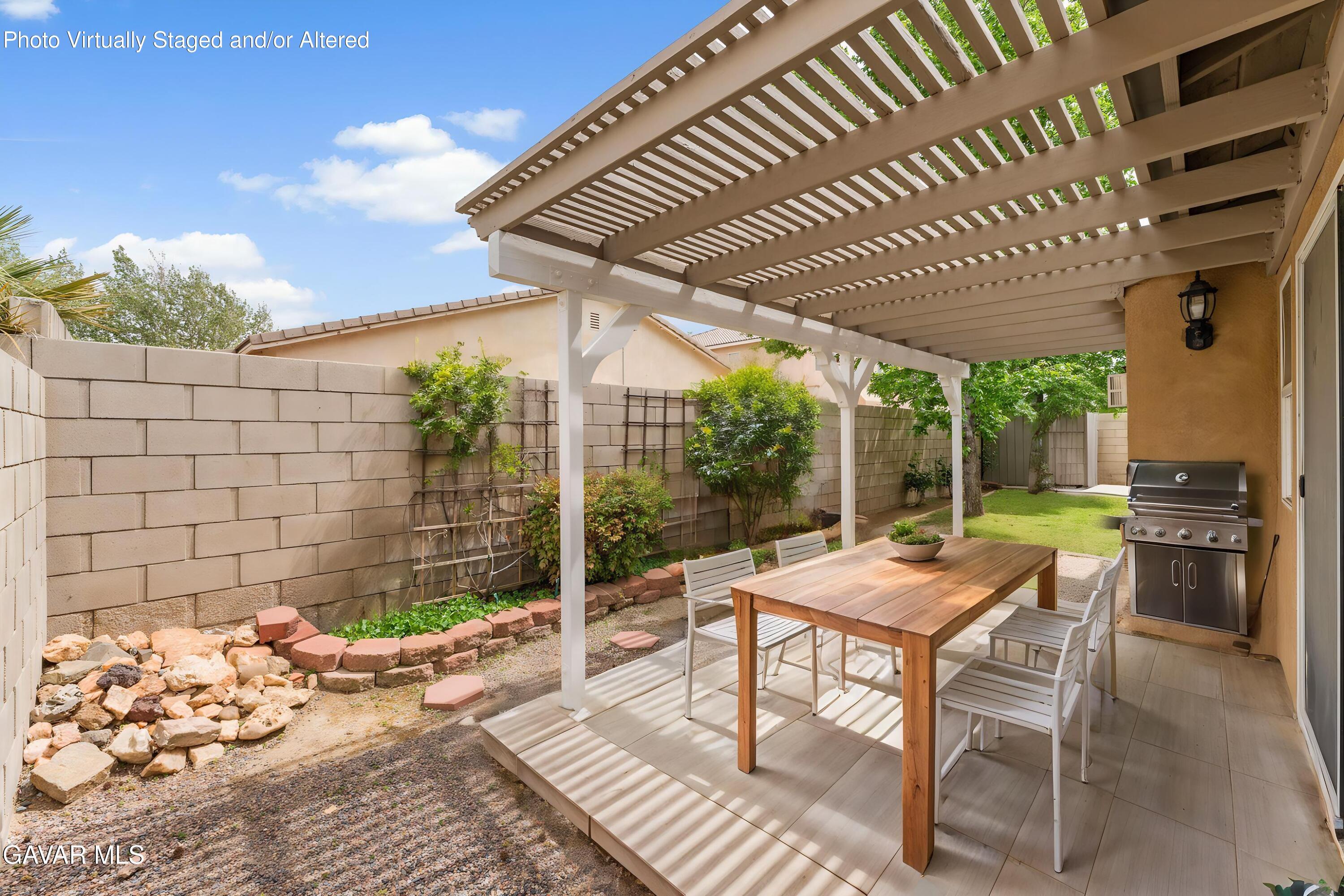 45334 Stadium Lane Lancaster, CA 93535 - Photo 28 of 36 a outdoor space with patio lots of furniture