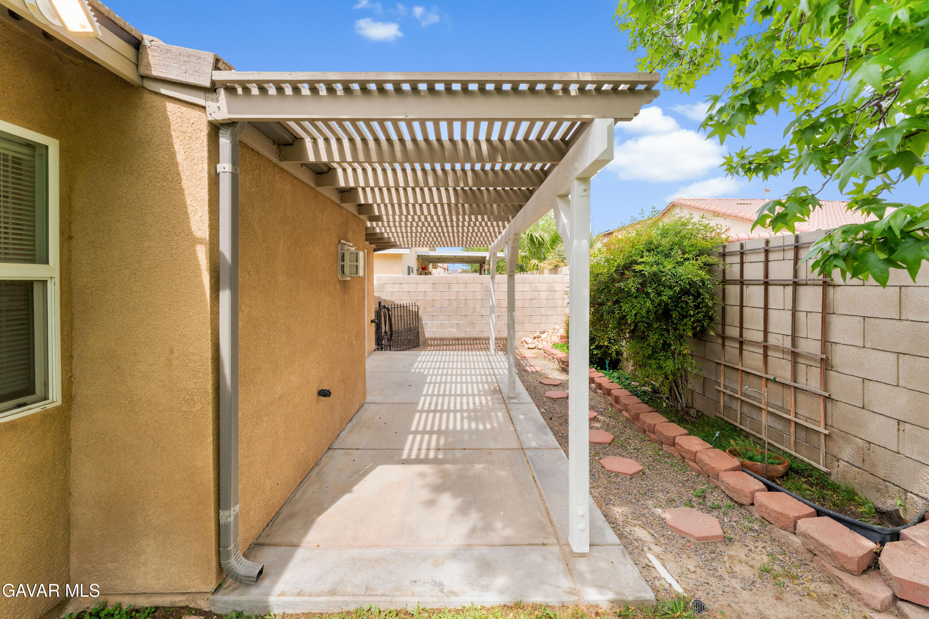 45334 Stadium Lane Lancaster, CA 93535 - Photo 31 of 36 a view of balcony with a potted plant
