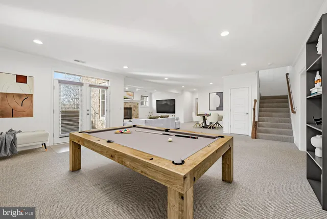 a view of a room with furniture and window