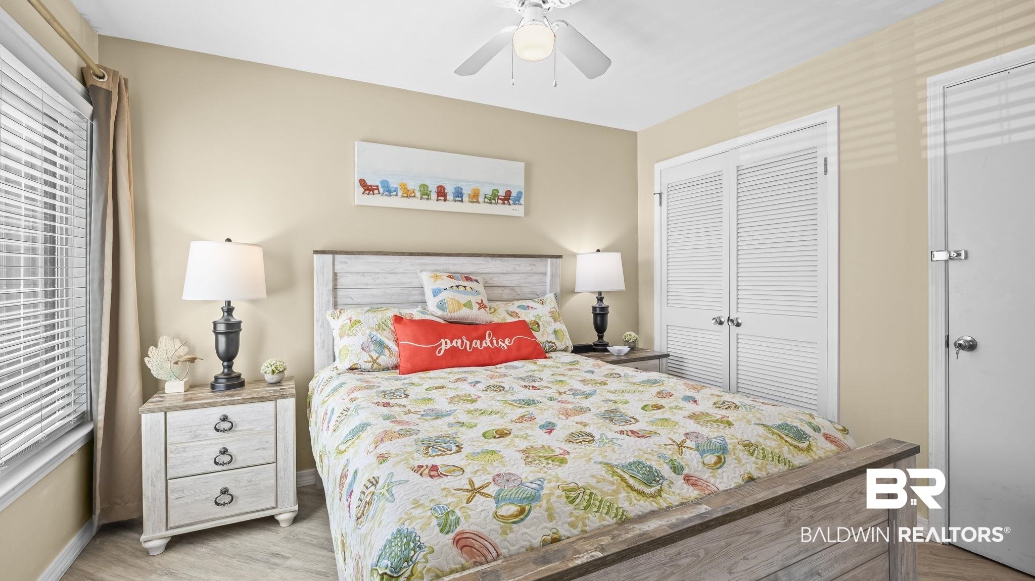 497 Plantation Road, Unit 1247 Gulf Shores, AL 36542 - Photo 8 of 29 Bedroom with ceiling fan, a closet, and light wood-style floors