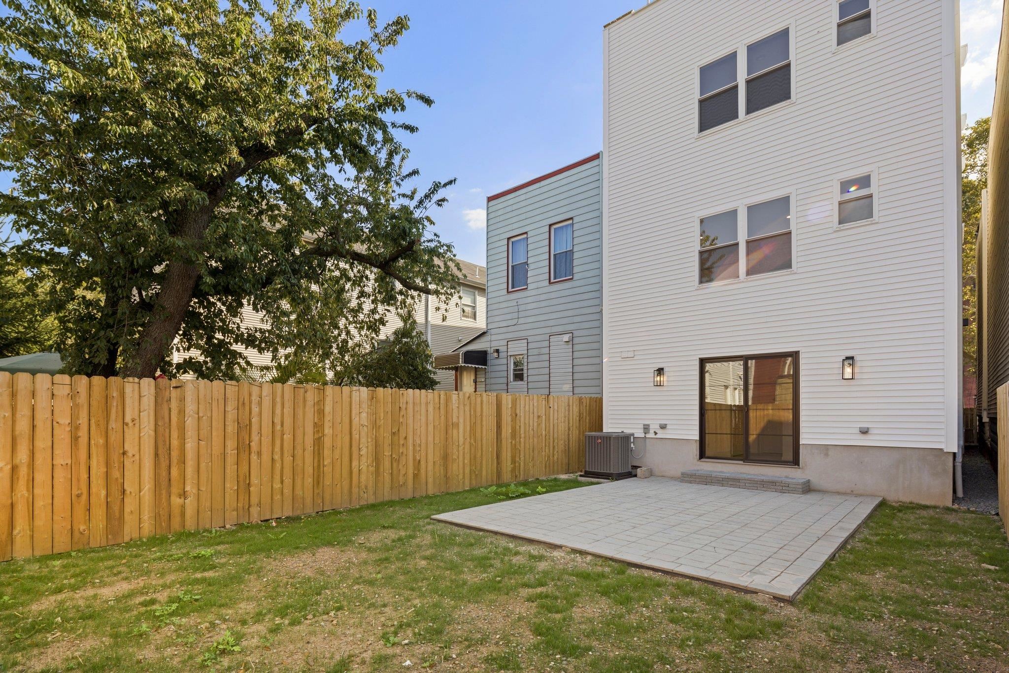 30 Wilkinson Avenue, Unit 1 Jersey City, NJ 07305 - Photo 16 of 17 a backyard of a house