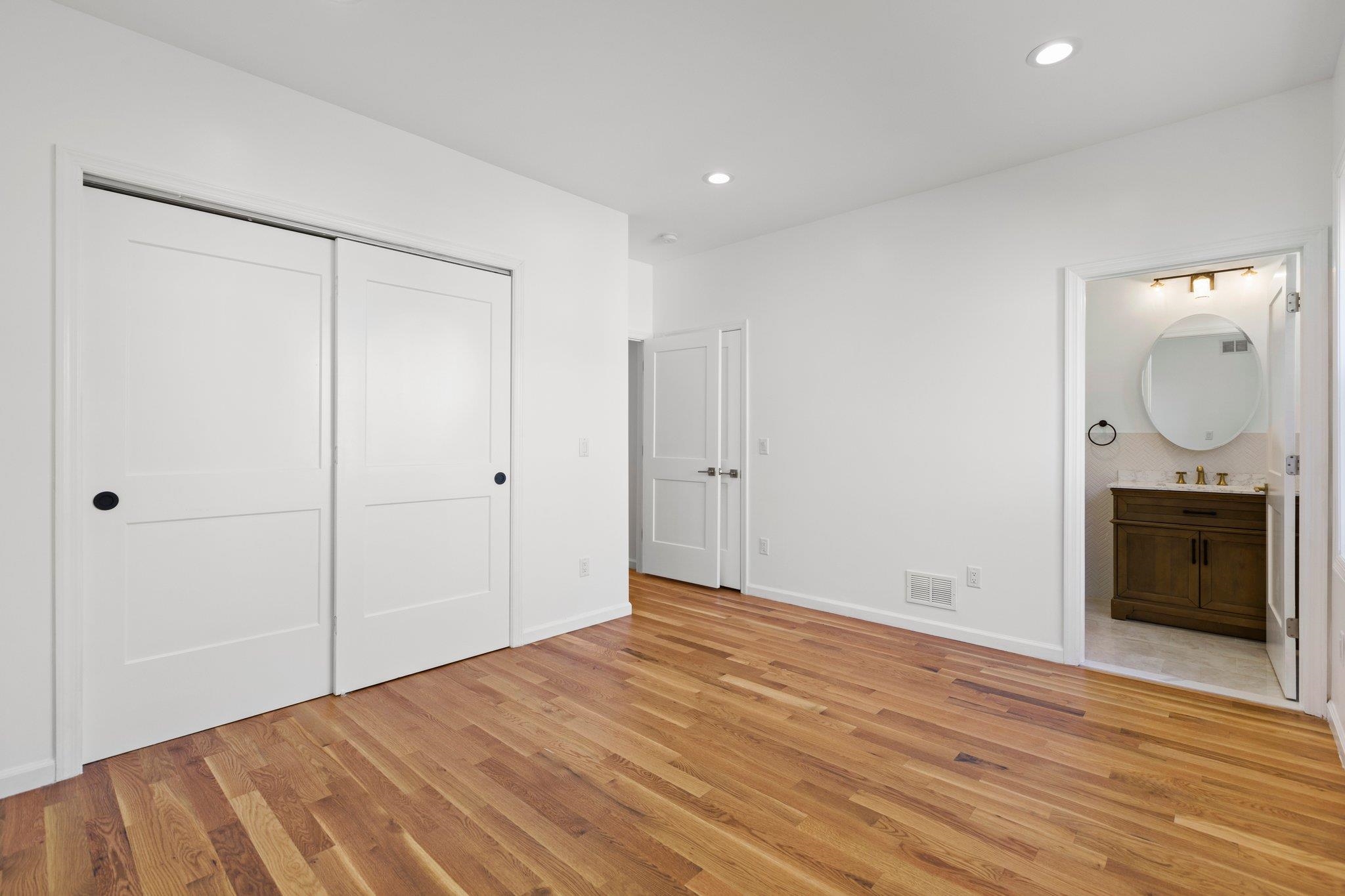 30 Wilkinson Avenue, Unit 1 Jersey City, NJ 07305 - Photo 7 of 17 a view of a livingroom with wooden floor