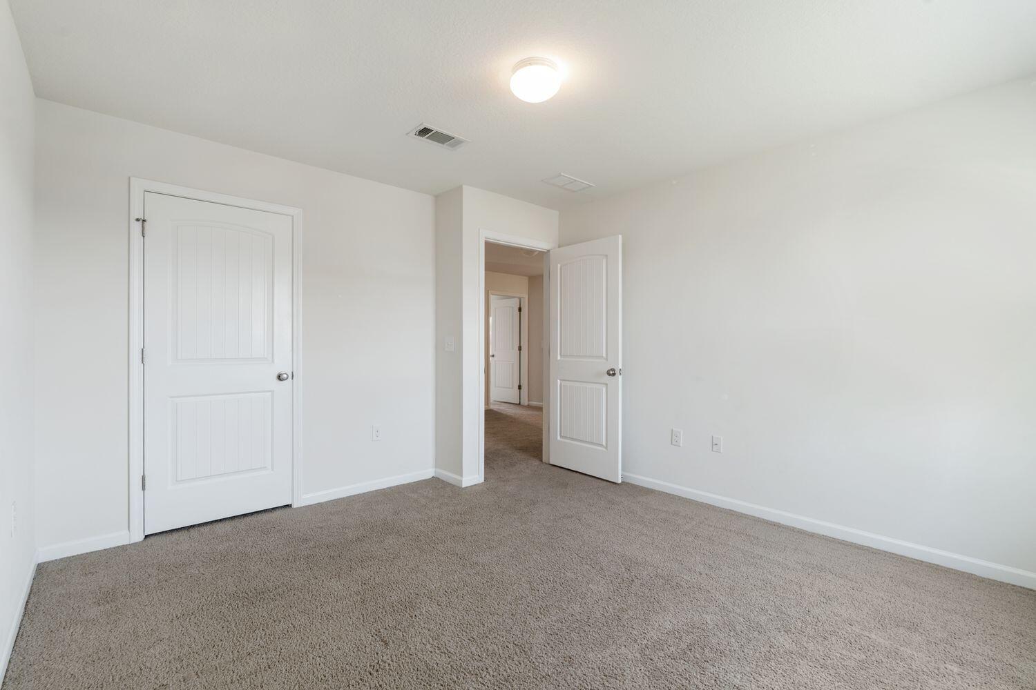 737 Widgeon Way Crestview, FL 32539 - Photo 22 of 36 a view of an empty room and closet area
