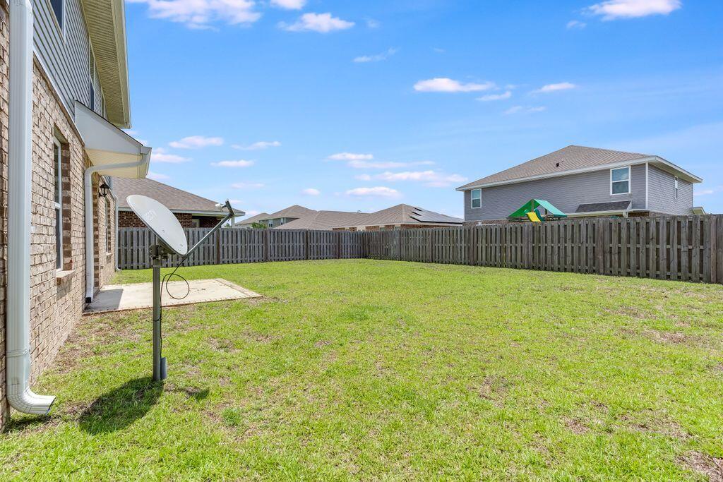 737 Widgeon Way Crestview, FL 32539 - Photo 31 of 36 a view of a backyard