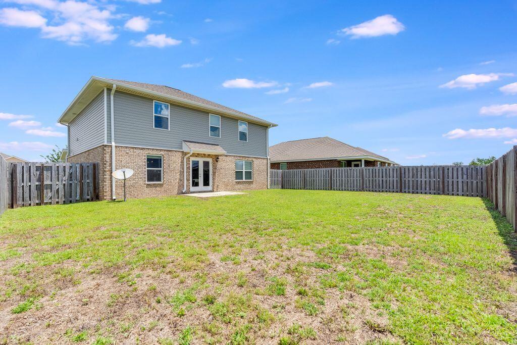737 Widgeon Way Crestview, FL 32539 - Photo 32 of 36 a front view of house with yard