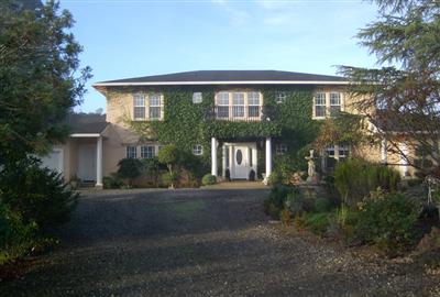 23229 Walling Road Geyserville, CA 95441 - Photo 1 of 8 a front view of house with yard and green space