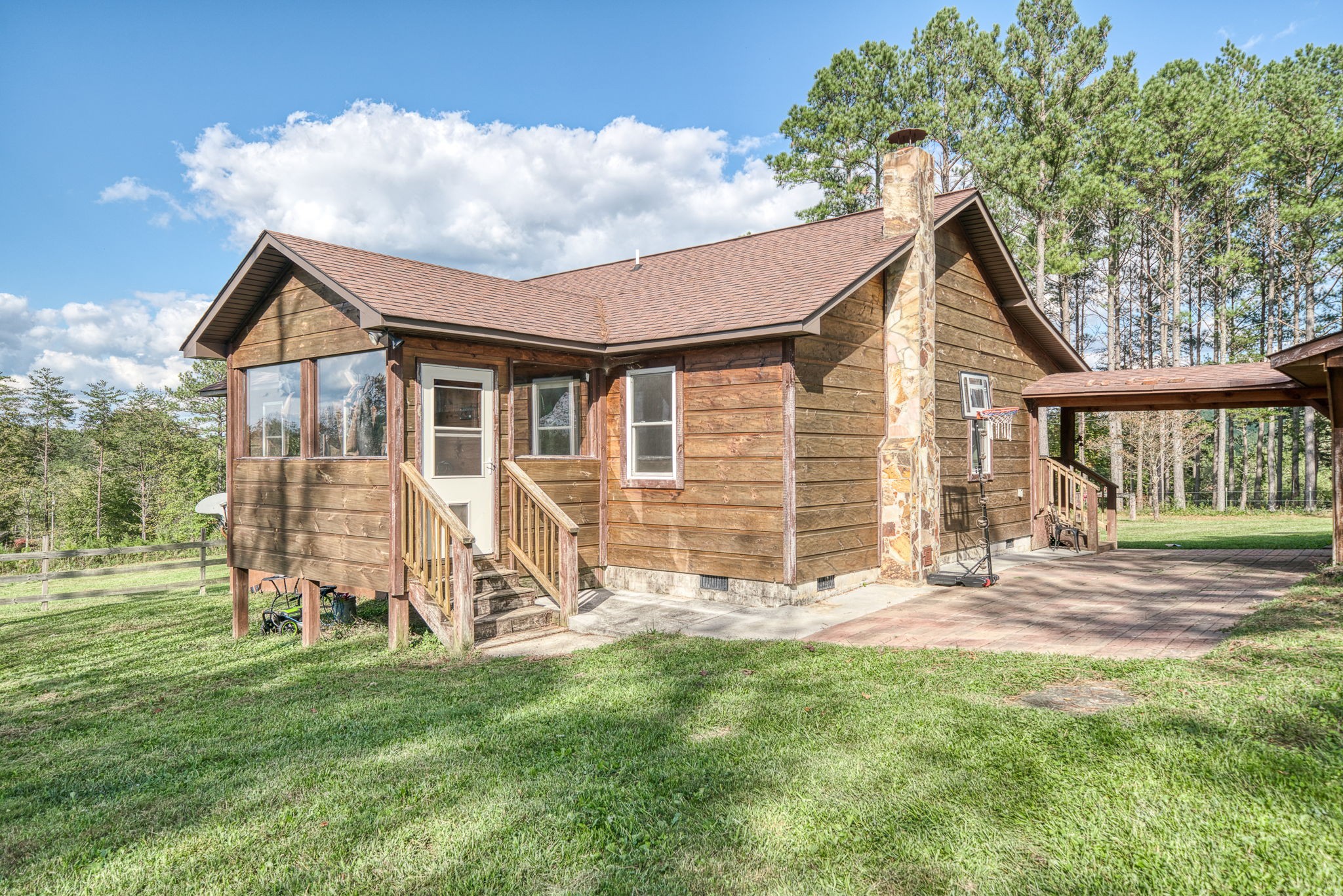 944 Flat Rock Road Crossville, TN 38572 - Photo 2 of 51 a house view with a garden space