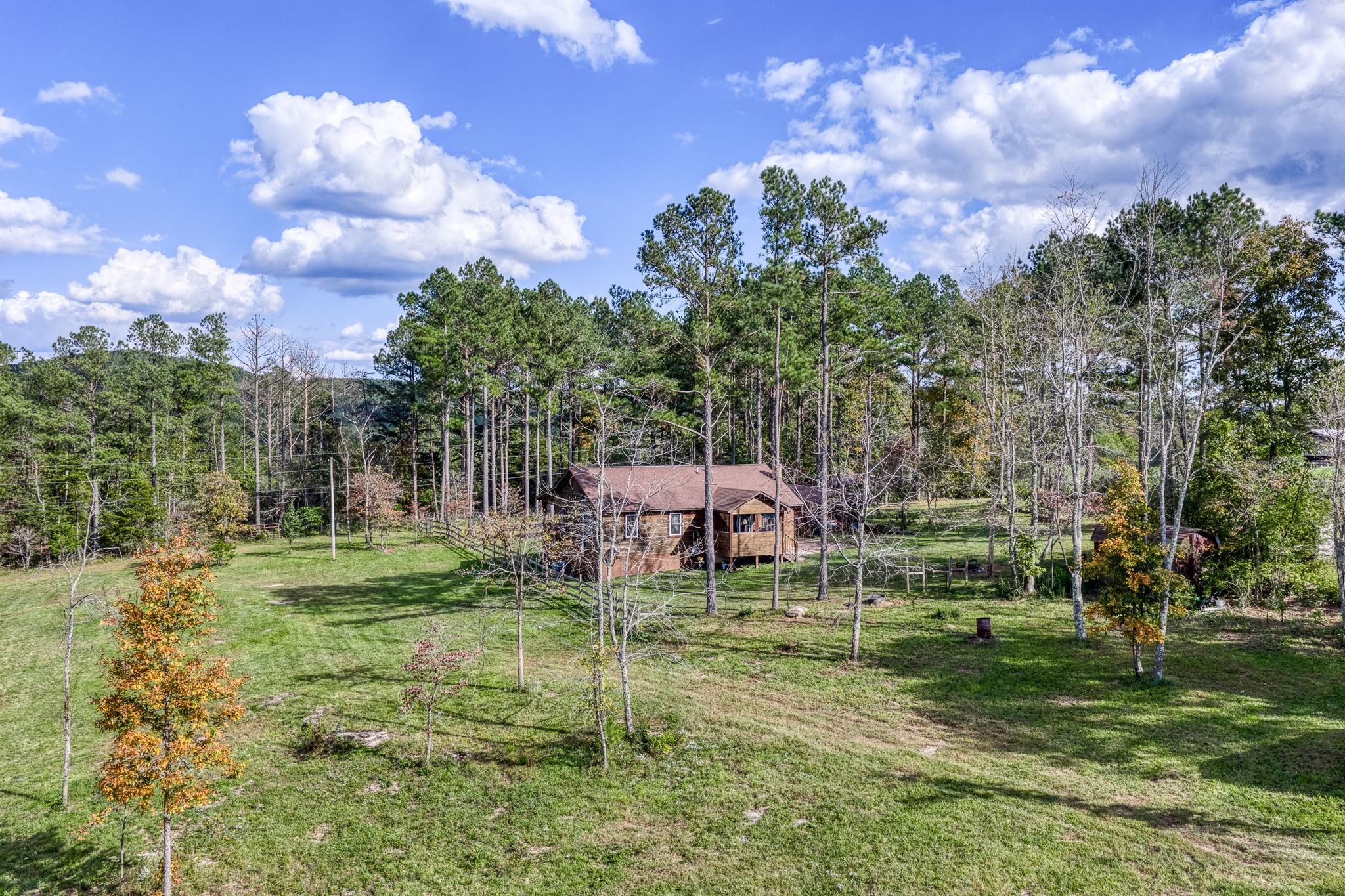 944 Flat Rock Road Crossville, TN 38572 - Photo 22 of 51 a backyard of a house with table and chairs