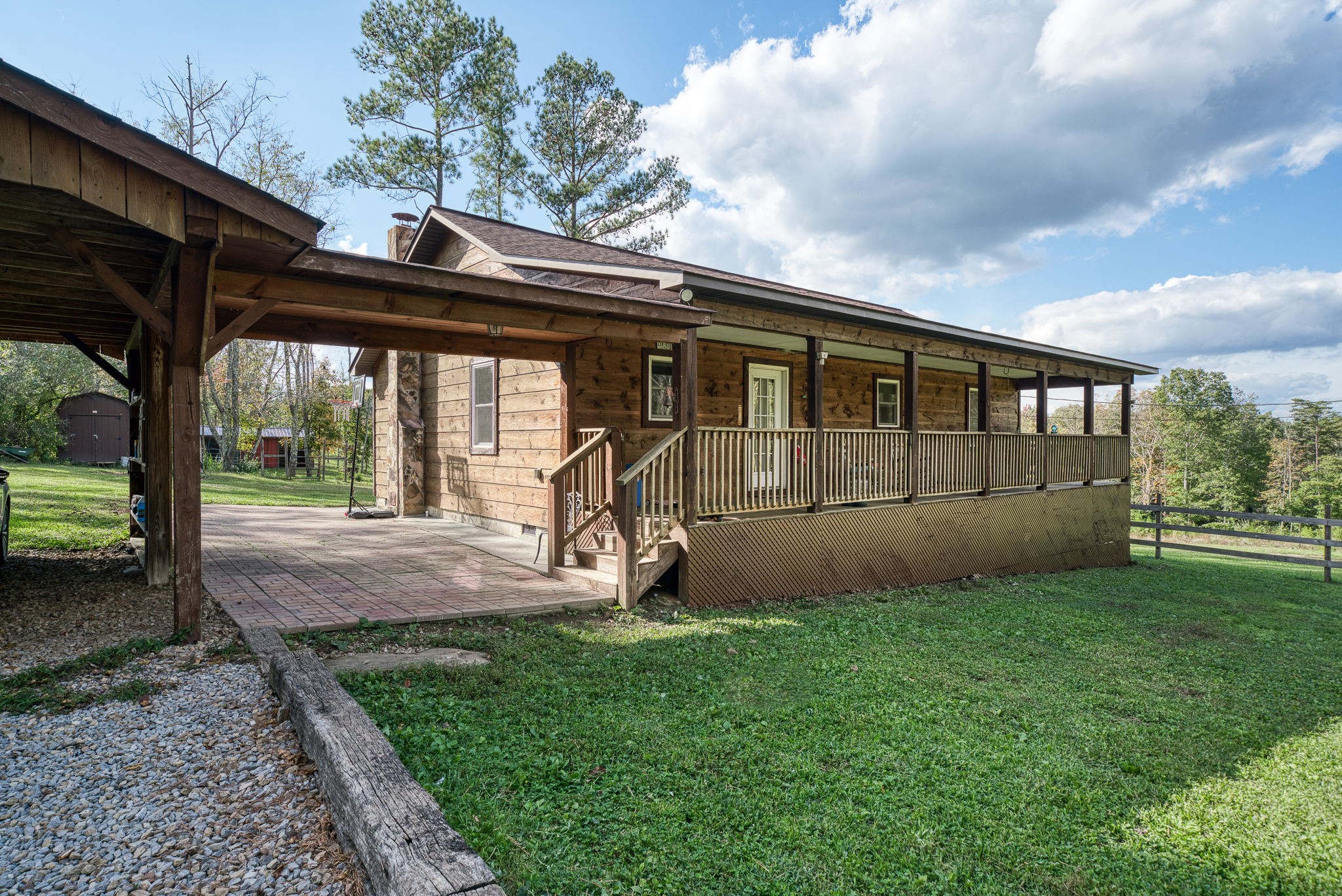 944 Flat Rock Road Crossville, TN 38572 - Photo 25 of 51 a view of backyard with deck and garden