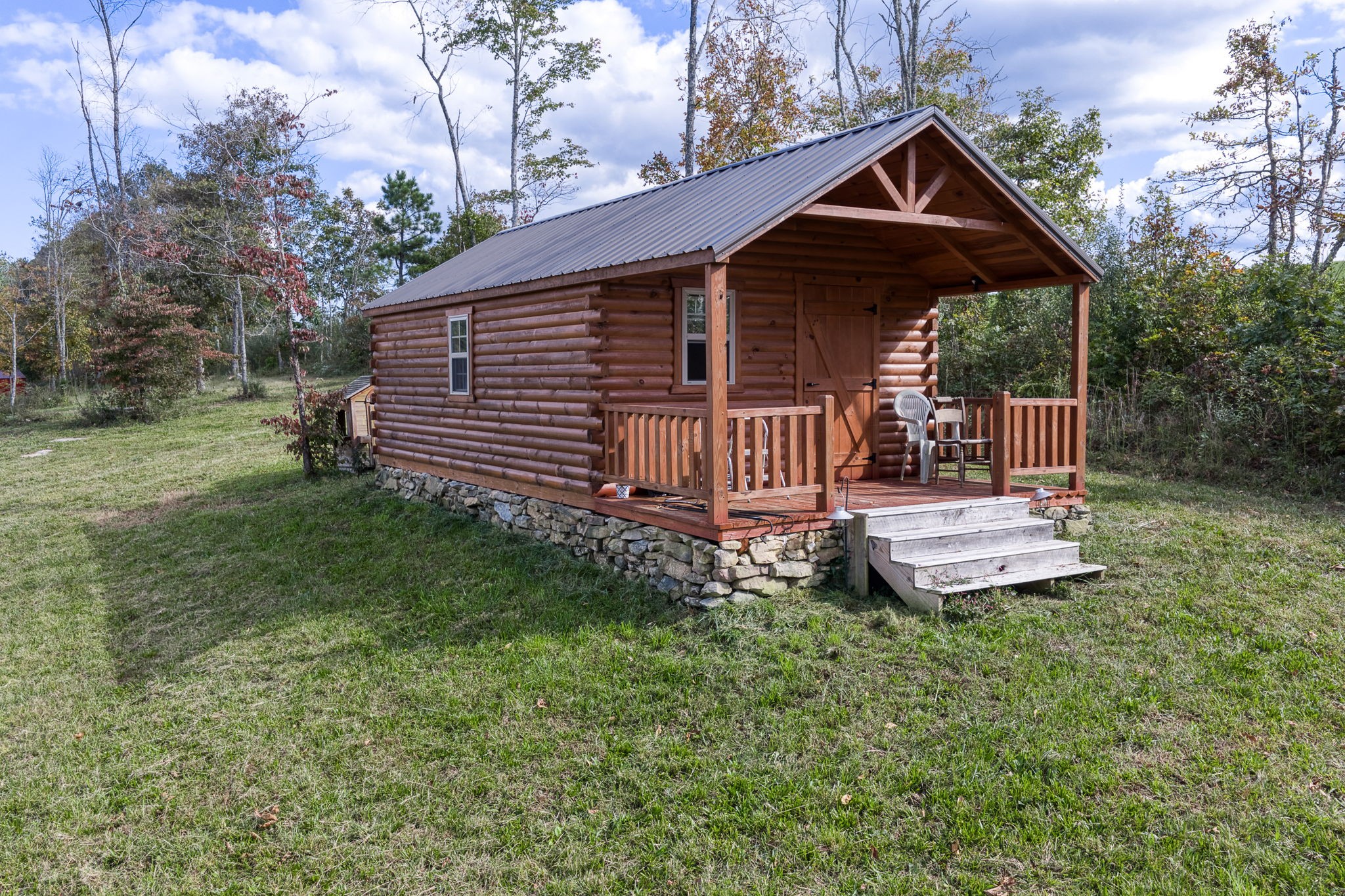 944 Flat Rock Road Crossville, TN 38572 - Photo 32 of 51 a front view of a house with garden