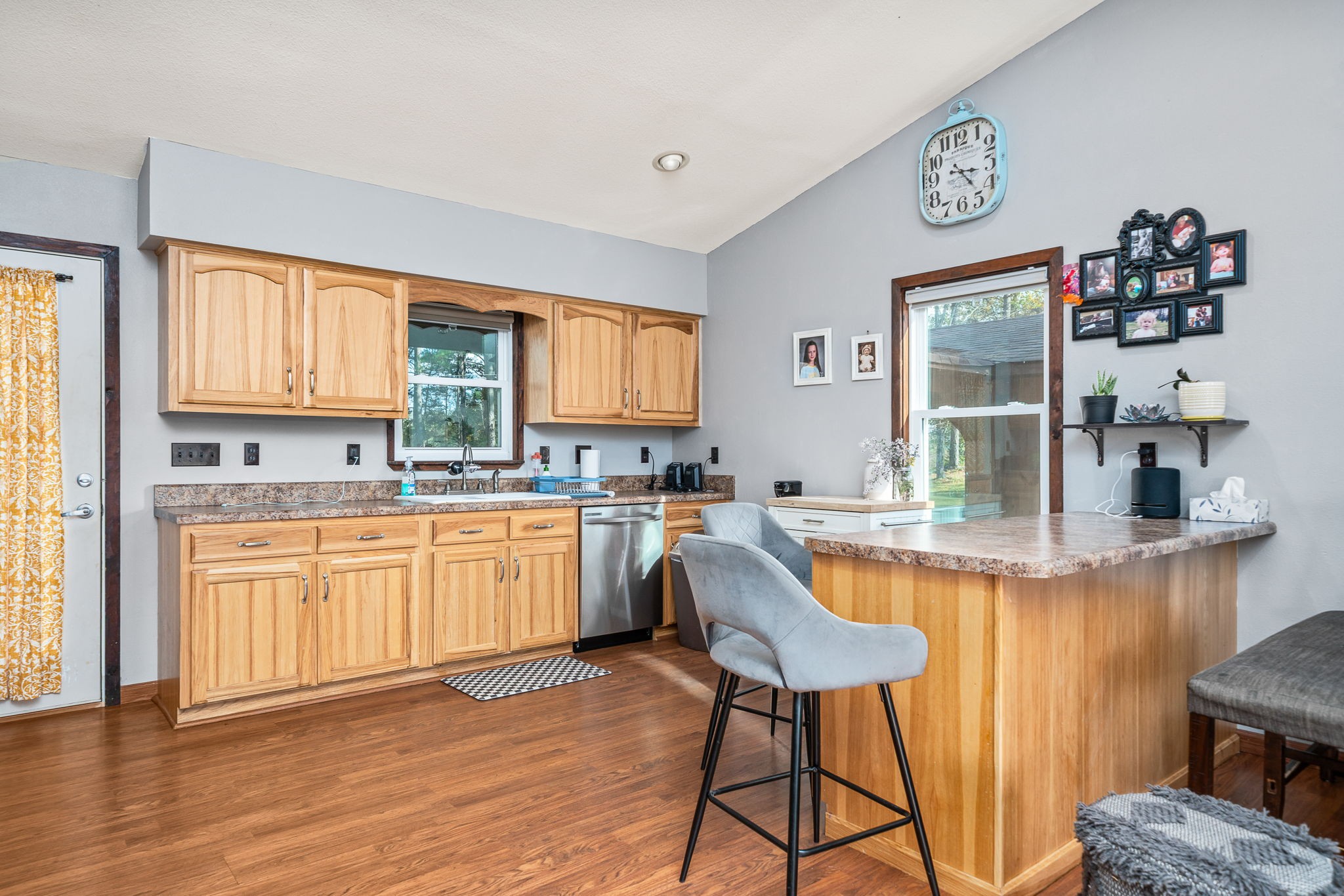 944 Flat Rock Road Crossville, TN 38572 - Photo 6 of 51 a kitchen with stainless steel appliances granite countertop a stove top oven a sink dishwasher and cabinets with wooden floor