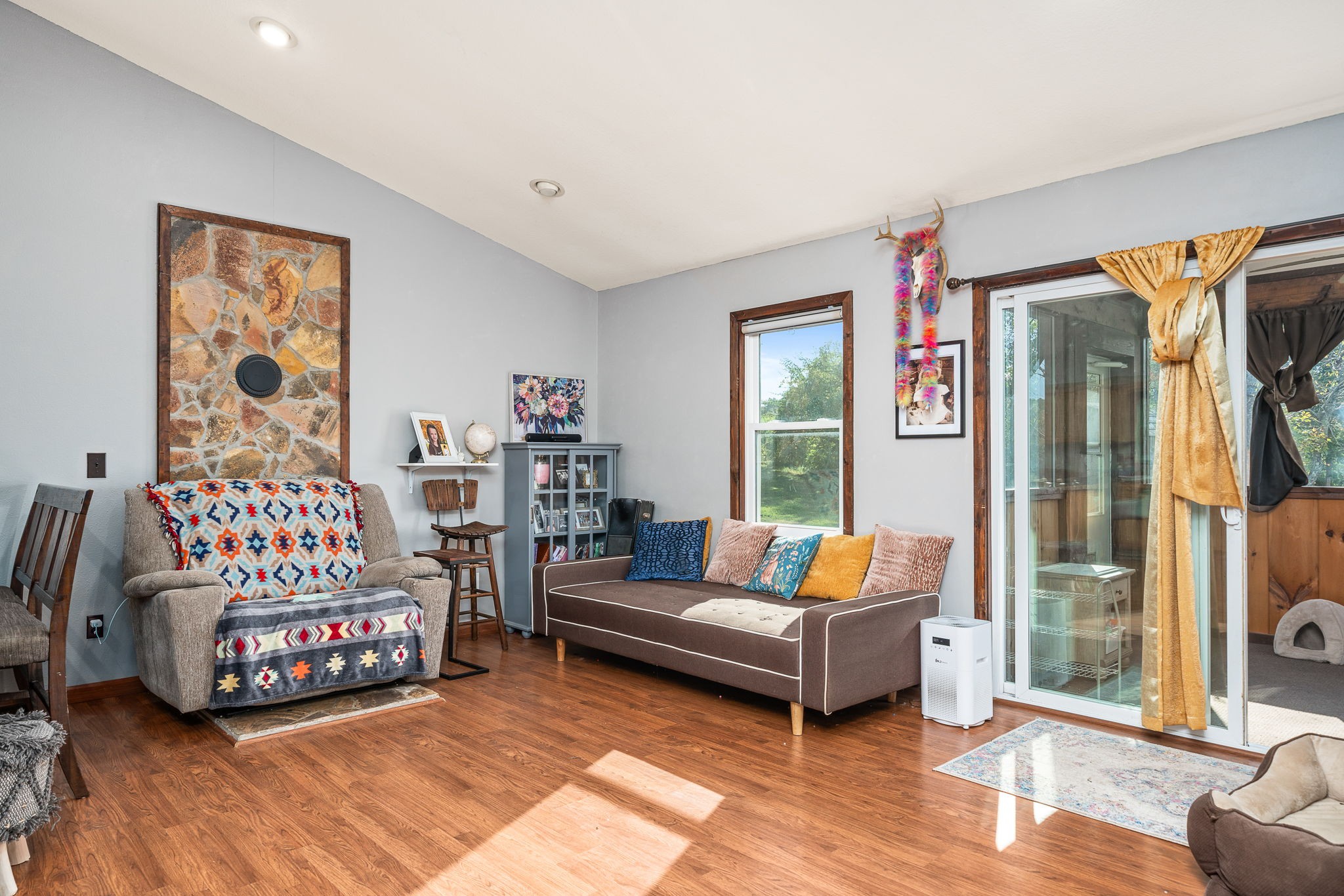 944 Flat Rock Road Crossville, TN 38572 - Photo 10 of 51 a bedroom with furniture and a large window