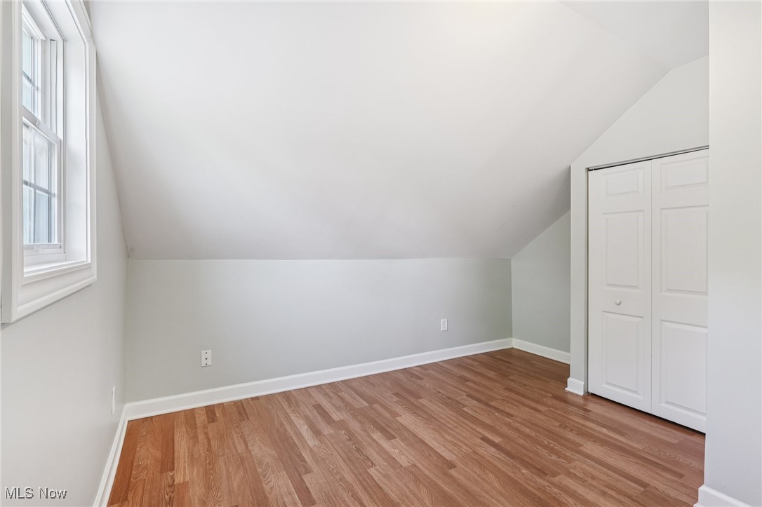 159 Eastland Road Berea, OH 44017 - Photo 24 of 38 Additional living space with light wood-type flooring and lofted ceiling