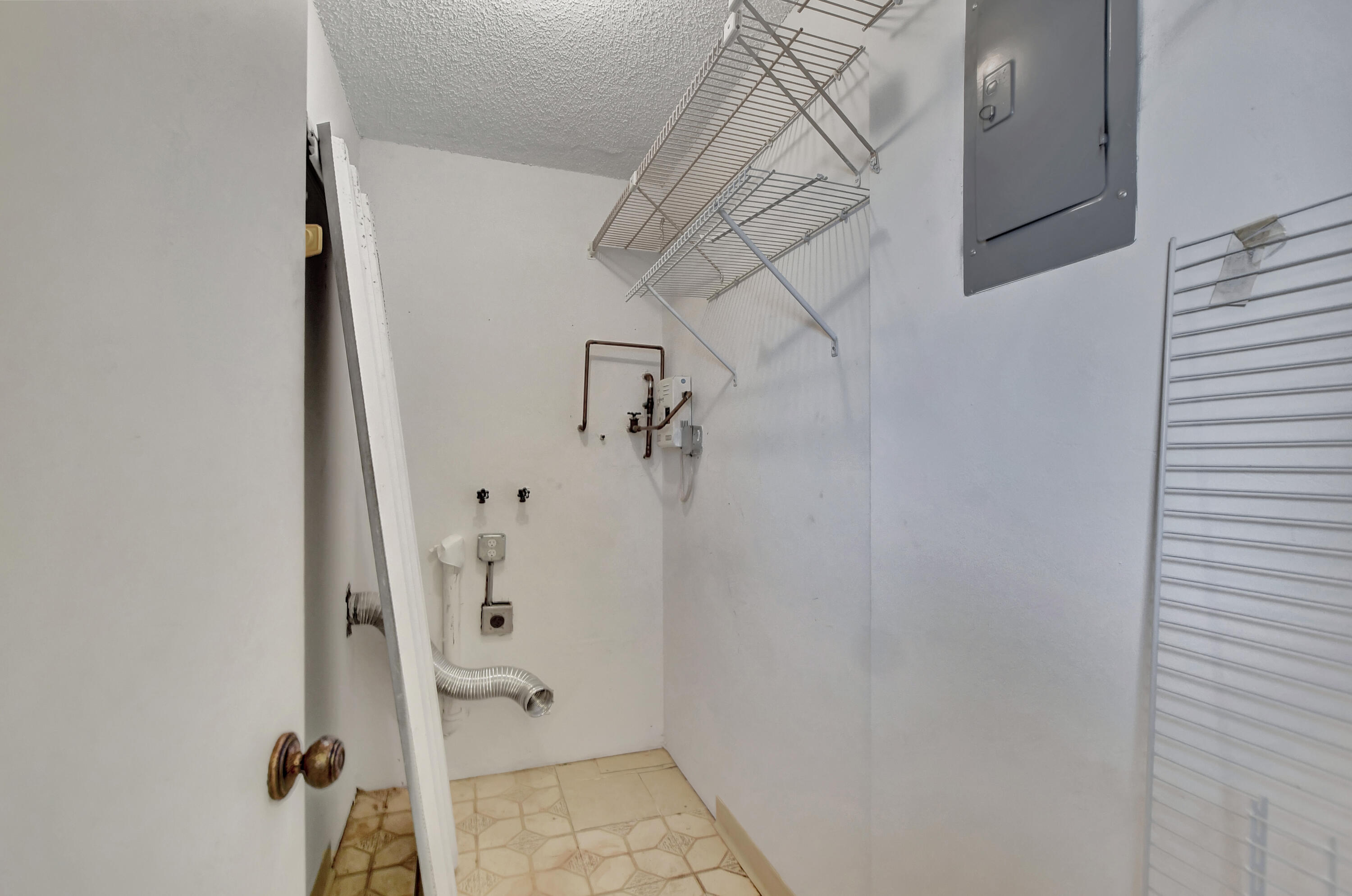 6699 Northwest 2nd Avenue, Unit PHP Boca Raton, FL 33487 - Photo 25 of 36 Laundry Area