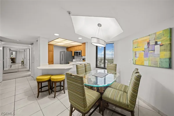 a view of a dining room with furniture