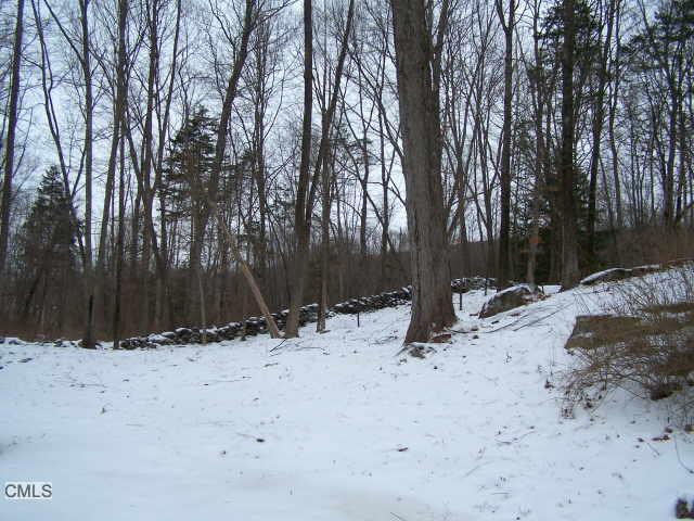 a view of snow on a road