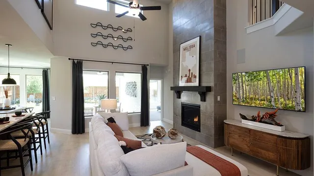 a view of living room with furniture and a large window