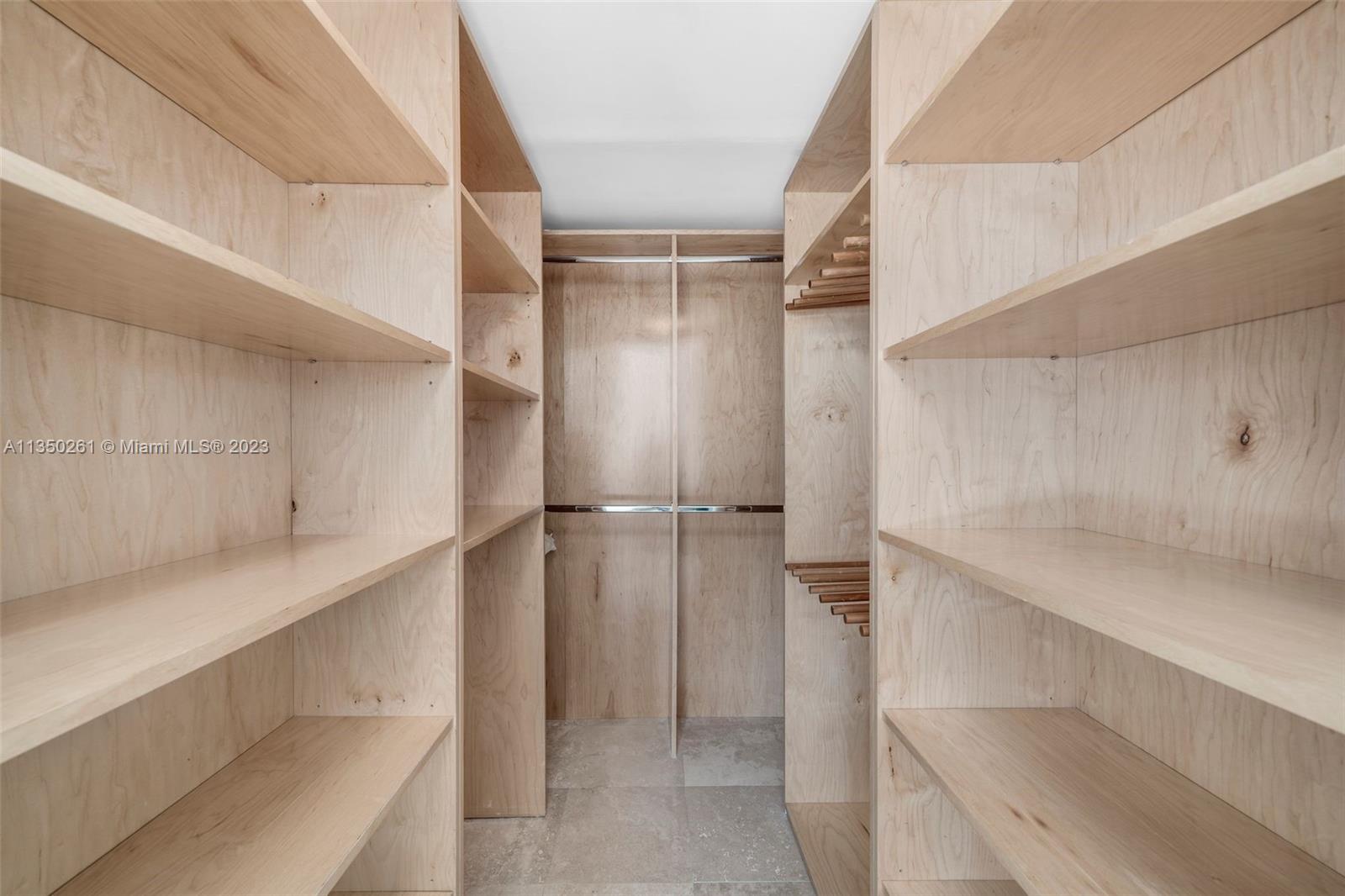 1401 Bay Road, Unit 207 Miami Beach, FL 33139 - Photo 12 of 26 Primary Bedroom Walk-in Closet
