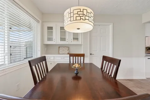 a view of a livingroom with furniture window and wooden floor