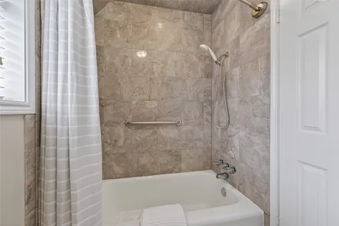 a bathroom with a bathtub