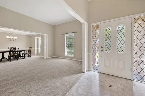 a view of a livingroom with furniture and a rug