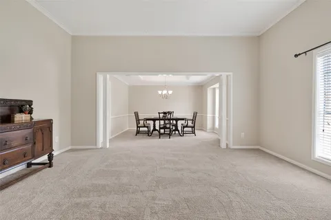 a livingroom with furniture and a window